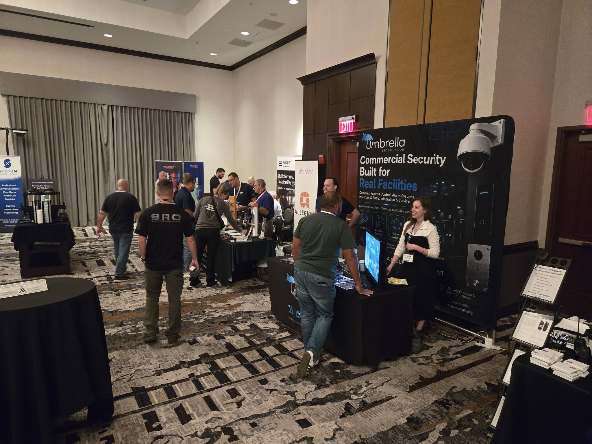 Conference attendees visiting 2026 vendor exhibits